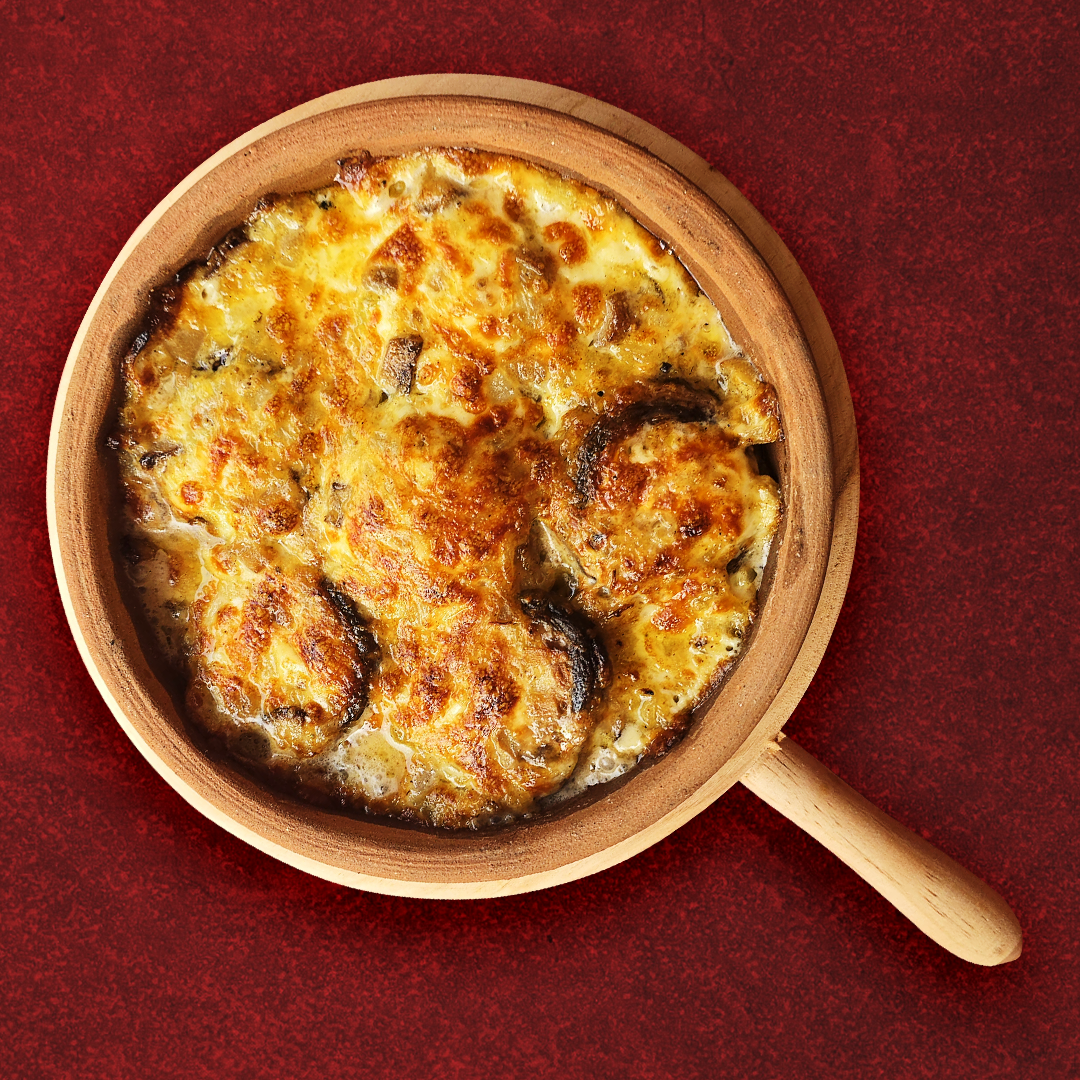 Funghi gratinati con formaggio